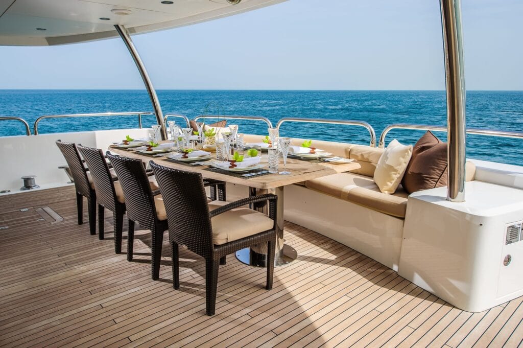 Elegant luxury travel experiences in 2025, including a yacht, private jet, and exotic resort views